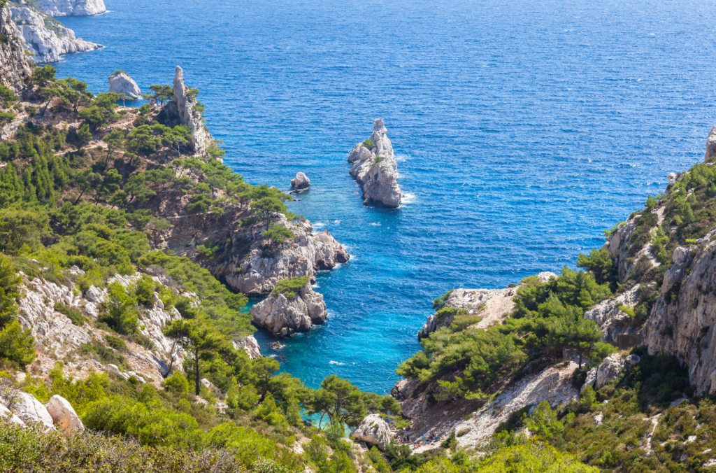 Indulge in the natural beauty of Calanque de Sugiton in Marseille, where rugged limestone cliffs meet the shimmering waters of the Mediterranean. This breathtaking inlet, nestled within the Calanques National Park, offers a serene escape from the urban hustle. Whether you're hiking along scenic trails, swimming in the crystal-clear coves, or simply soaking in the panoramic views, Calanque de Sugiton promises an unforgettable coastal experience. Explore Marseille's hidden gem and discover the allure of Calanque de Sugiton.