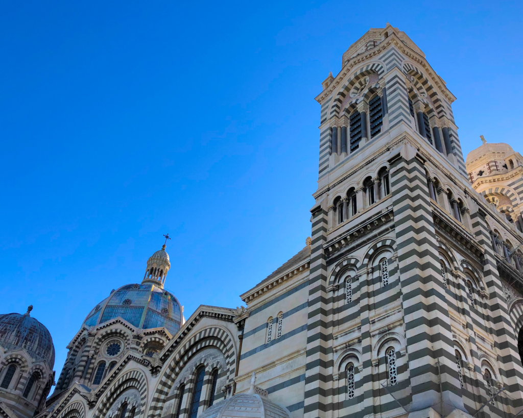 Marvel at the architectural splendor of Marseille's La Major Basilica, a magnificent symbol of the city's cultural and religious heritage. With its striking Byzantine-Romanesque design, adorned with intricate details and soaring domes, the basilica is a masterpiece of grandeur and spirituality. Picture yourself standing before the majestic façade, immersed in the tranquility of this sacred sanctuary. Whether you're exploring its ornate interior, attending a religious service, or simply admiring its beauty from afar, La Major Basilica offers a profound and unforgettable experience. Discover the timeless allure of Marseille's religious landmark and immerse yourself in the rich history and spirituality of La Major Basilica.